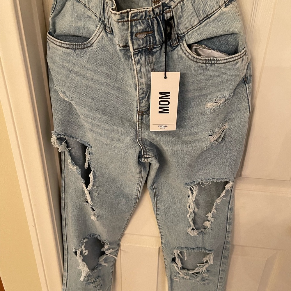 Mom jeans with tears